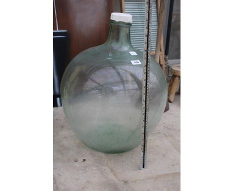 A LARGE VINTAGE GLASS CARBOUY 