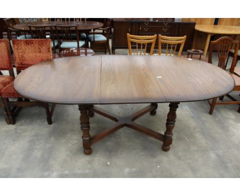 AN ERCOL EXTENDING DINING TABLE 64" X 42" (LEAF 20") ON TURNED LEGS. ONE LEG A/F 