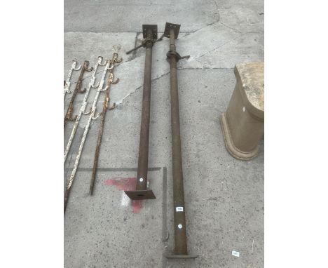 A PAIR OF METAL ACRO PROPS 