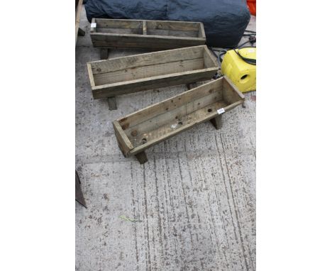 THREE RUSTIC WOODEN TROUGH PLANTERS 