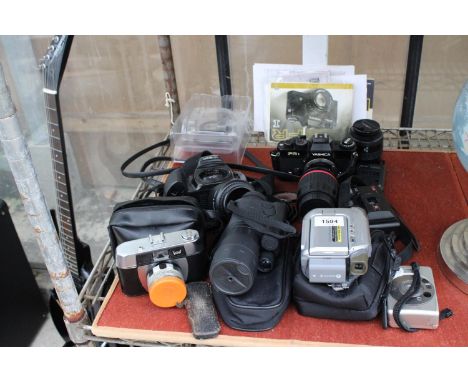 AN ASSORTMENT OF CAMERAS TO INCLUDE YASHICA AND A YUKON NIGHT VISION SCOPE ETC 