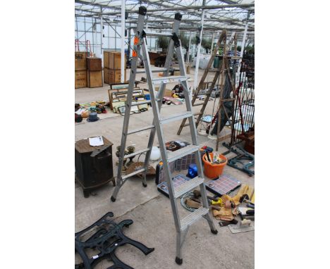 AN ALUMINIUM THREE WAY MULTIFUNCTIONAL LADDER 
