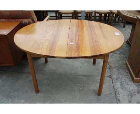 AN ERCOL BLUE LABEL OVAL PINE EXTENDING DINING TABLE, 54" X 42" (LEAF 20") 