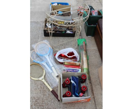 AN ASSORTMENT OF ITEMS TO INCLUDE TENNIS RACKETS, ROLLER SKATES AND A CRICKET SET ETC 