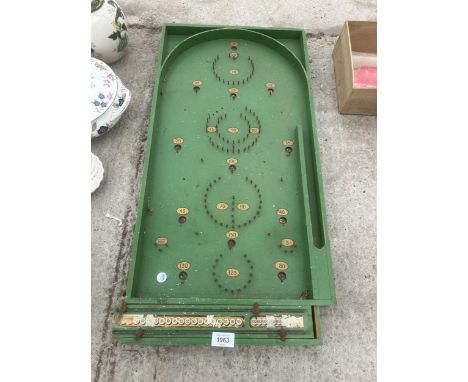 A VINTAGE WOODEN BAGATELLE GAME WITH BALL BEARINGS 