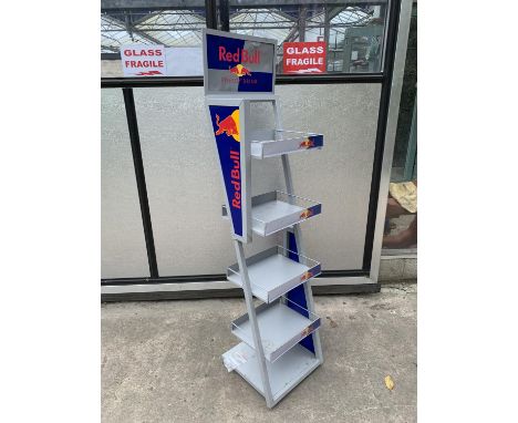 A RED BULL 5 SHELF ADVERTISING STAND (SOLD ONLY TO THE TRADE), HEIGHT 129CM 