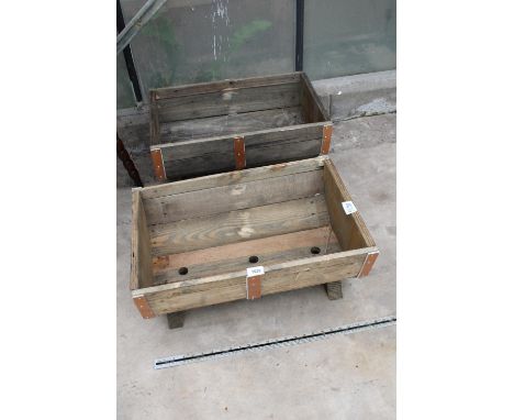 A PAIR OF WOODEN TROUGH PLANTERS 