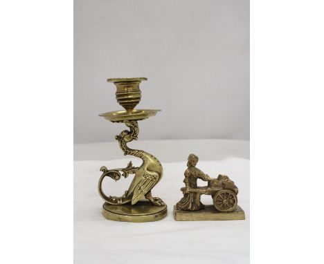 A VINTAGE BRASS GRYPHON CANDLESTICK PLUS A MOLLY MALONE FIGURE 