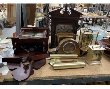 A QUANTITY OF CLOCKS TO INCLUDE TWO MANTLE CLOCKS, A CARRIAGE CLOCK, ANNIVERSARY CLOCK, WALL CLOCK, PLUS A BAROMETER 