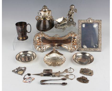 A small collection of assorted plated items, including a Victorian salt, modelled as a cupid pushing a wheelbarrow, height 11