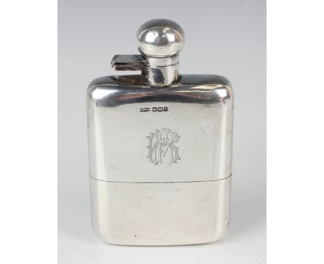 A George V silver hip flask of curved rectangular form with a detachable cup, Sheffield 1923 by James Dixon &amp; Sons Ltd, w