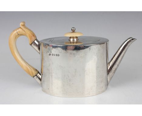 A Victorian silver teapot of plain oval form with ivory finial and handle, London 1875 by Francis Boone Thomas, weight 588.8g