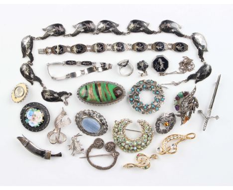 Six pieces of niello silver jewellery, comprising a necklace, two bracelets, a pendant with chain, a ring and a single pendan