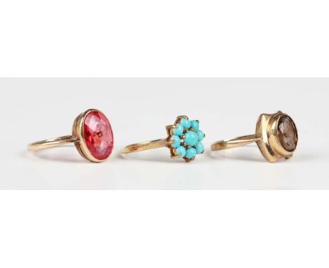 A gold ring, mounted with a synthetic oval cut ruby, detailed '9ct', ring size approx N, a 9ct gold ring, mounted with an ova