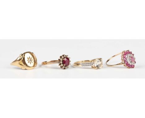A gold, ruby and colourless gem set oval cluster ring, detailed '18K', weight 2g, ring size approx L1/2, a 9ct gold, pink sap