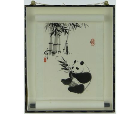 A Chinese ink scroll painting, study of panda and bamboo trees, signed with 2 seals, i 19" x 13", mounted in cabinet frame.