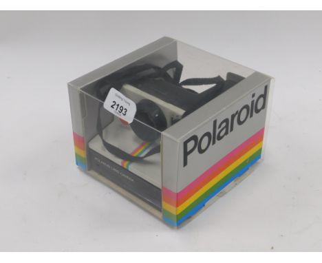 A Polaroid 1000 land camera. 