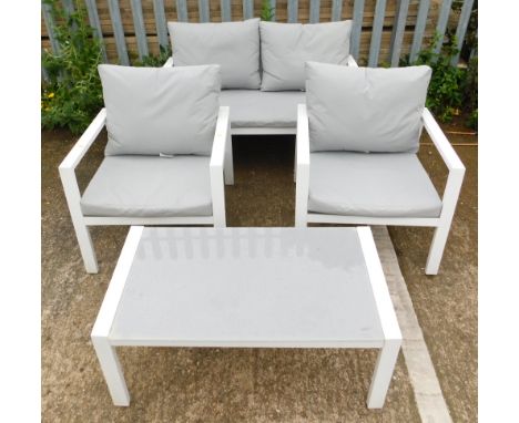A white metal and grey finish garden set, comprising sofa, two armchairs, coffee table and cushions. 