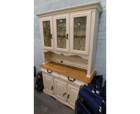 A painted pine kitchen dresser, with three astragal glazed drawers above central shelf, with two drawers and three cupboard d