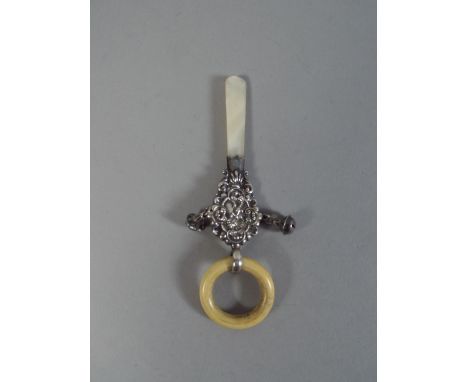 A Mother of Pearl and Silver Mounted Child's Rattle with Bone Teething Ring. Centre Silver Medallion Embossed 'Puss In Boots'