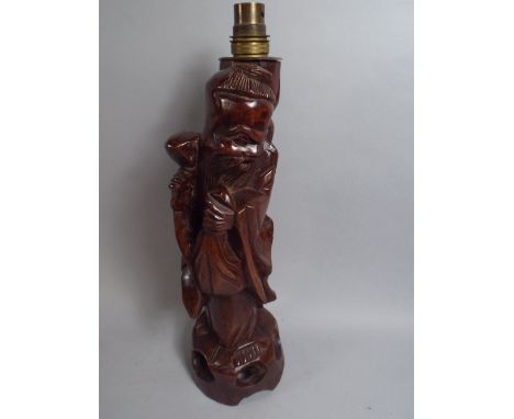 An Early 20th Century Chinese Carved Root Wood Table Lamp Modelled as Shou-Lao The God of Longevity. 38cm High