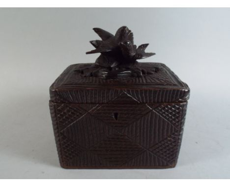 A 19th Century Black Forest Carved Linden Wood Tea Caddy. The Top Decorated with Carved Birds. 15x12x17cm