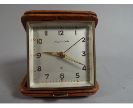 A Mid 20th Century Pig Skin Cased Alarm Clock, The Dial Marked Mappin and Webb.7x7cm