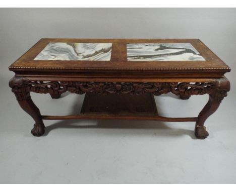 A 20th Century Oriental Carved Coffee Table with Two Inset Marble Panels on Cabriole Supports with Claw and Ball Feet. Stretc