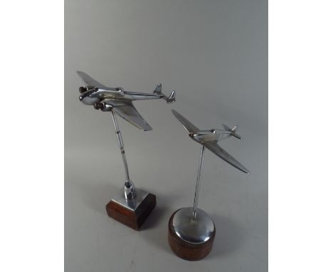 Two Mid 20th Century Art Deco Chrome Model Aeroplanes Supported on Wooden Plinths. The Tallest 29cm High