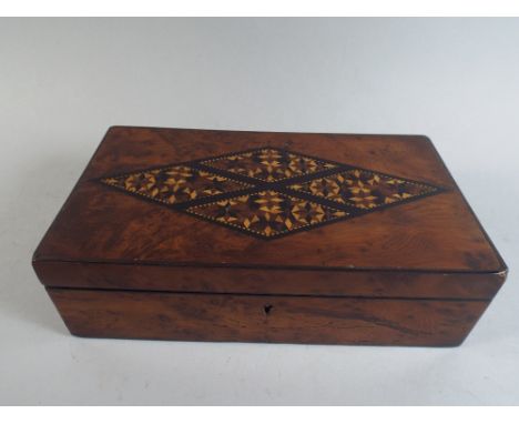 A 19th Century Burr Yew Wood Box. The Top with an Inlaid Parquetry Panel. 23x7x13cm