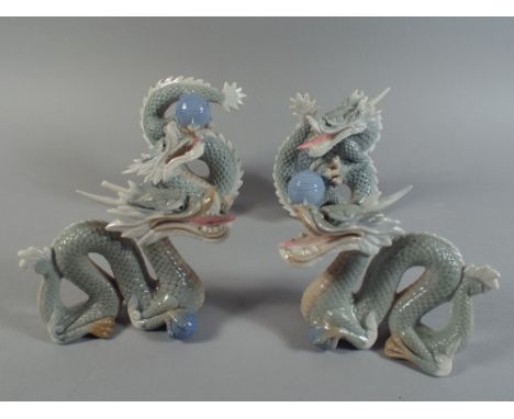 A Set of Four Chinese Ceramic Dragon Ornaments. (Two with Losses to Horns)