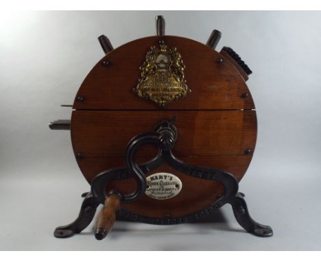 A Kent's Knife Cleaner with Improvements Patented 1870-1882-1887. Gilt Brass and Enamel Plaques and Iron Stand.