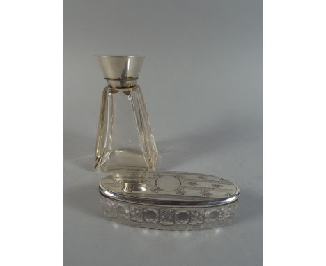 A Silver Topped Scent Bottle. The Hinged Lid Monogrammed M, Together with a Silver Lidded Glass Dressing Table Pot. 