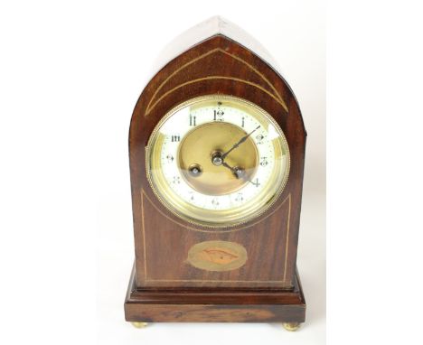 A Junghans early C20th oak cased bracket clock with engraved silvered dial carved egg and dart decoration, two train movement