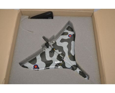 A 1/32 scale (approx) Bravo Delta hand-made mahogany model of Avro Vulcan XH558. Model in good condition with some damage to 