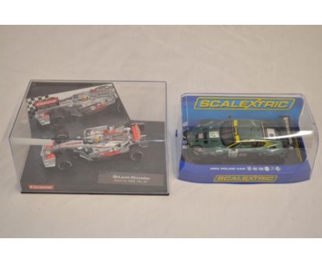 2 1/32 scale electric slot cars:A Mclaren-Mercedes Formula 1 race car 2008, "No 22" by Carrera "Evolution" (model no 27277) i