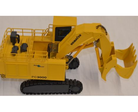 1/50 scale diecast Komatsu PC 3000 "Super Shovel" hydraulic excavator model by NZG (Model no 482/442). Working rubber tracks,