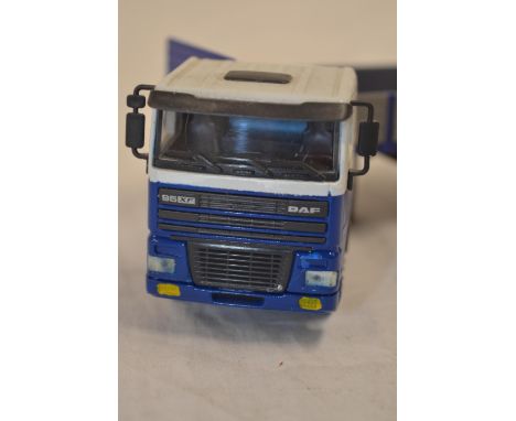 5 boxed 1/50 scale diecast truck models by JOAL including A DAF 95XF large tipper lorry (broken right side wing mirror), Volv