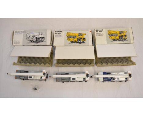 3 1/50 scale diecast Demag mobile telescopic crane models by Conrad: 2 x AC155 (one in Baldwins company markings) and an AC50