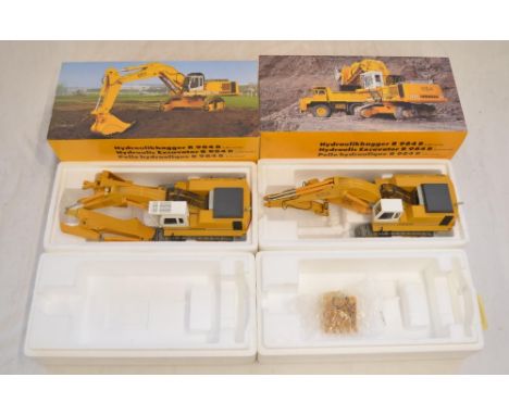 2 damaged 1/50 scale diecast Liebherr R984B Litronic hydraulic excavator models by Conrad (model no 2836), both with working 