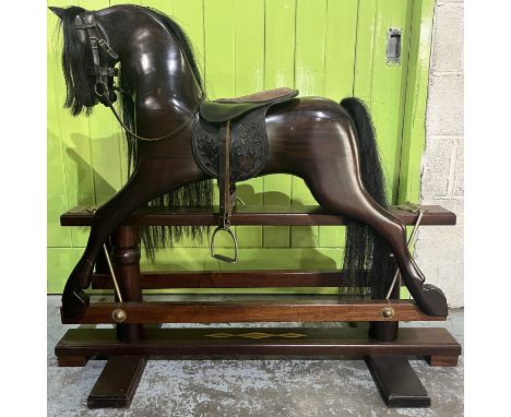 Rocking horse on swing stand complete with tack and accessories, plaque on front reading "All the Kings Horses, supplied by B