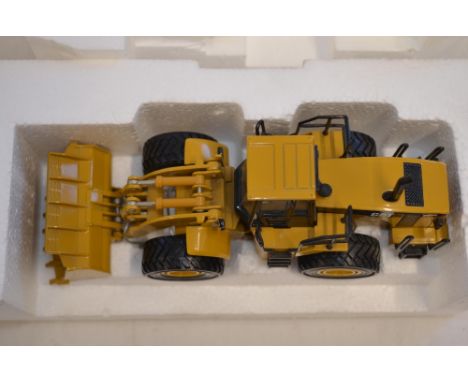 4 boxed 1/50 scale diecast Caterpillar models:325BL excavator by NZG (model no 367) in fair previously displayed condition wi