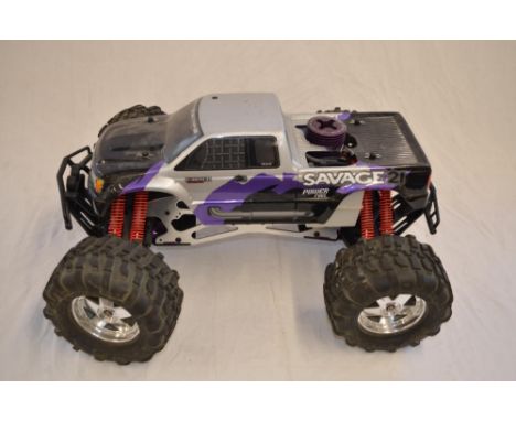 An HPI Savage 21 1/8 scale nitro radio control off road car. Not tested, A/F. With instructions, engine manual and a "RotoSta