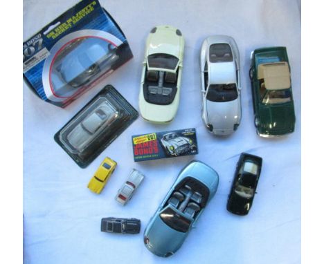 Collection of Aston Martin model vehicles, various makers and scales inc. James Bond vehicles etc 