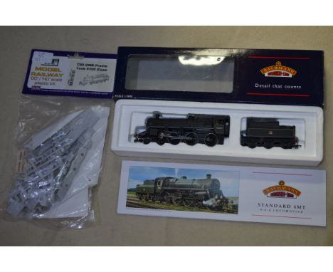 Boxed as new Bachmann branch line, standard 4MT 75059 BR line, black E crest and BR 2 tender, with guarantee certificate and 