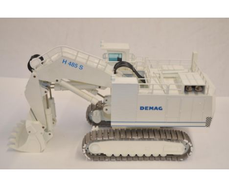 Boxed 1/50 scale diecast Demag 485S Hydraulic Excavator model by NZG (art no 357) in fair/good previously displayed condition