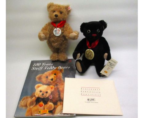 Steiff Teddy Bear with Book "100 Years of Steiff Teddy Bears" in blonde mohair, H25cm, boxed with certificate, and a Steiff M