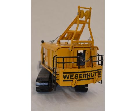 Boxed 1/50 scale diecast Liebherr 32 K fast erecting crane model by Conrad (model no 2023). Fair previously displayed conditi