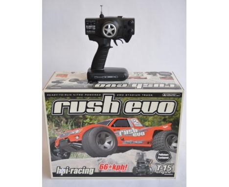 Boxed HPI Rush Evo 2WD 1/10 scale ready to run nitro powered radio control car with radio gear, instructions etc. 