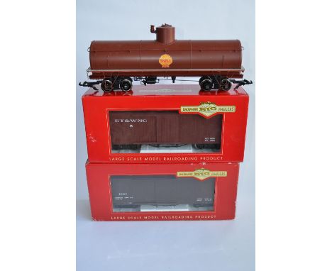 2 boxed Bachmann G gauge box cars and an oil wagon:Item No 93324, please note original model markings removed/painted over.It